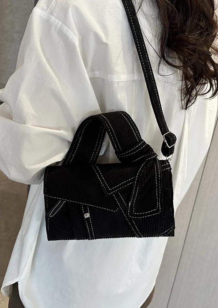 BLACK PATCHWORK PATTERN SLING BAG