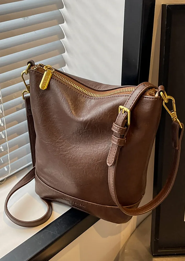 BROWN TEXTURED GEOMETRIC BUCKET BAG