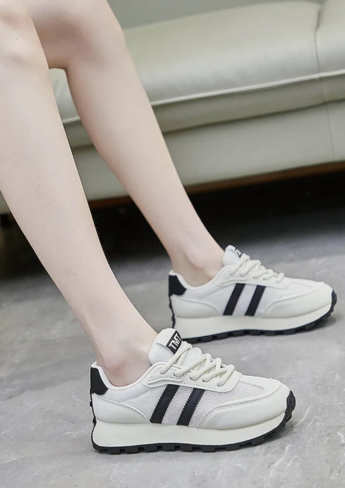 ROUNDED TOE BLACK STRIPED TRAINERS