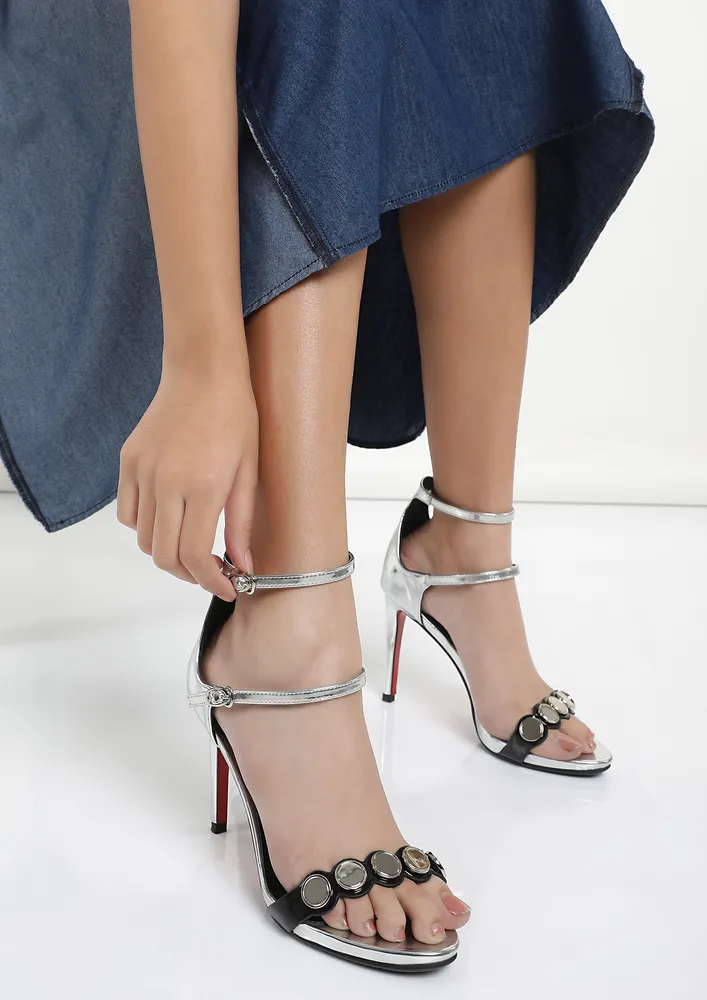 REFLECTING ELEGANCE SILVER HEELED SANDALS