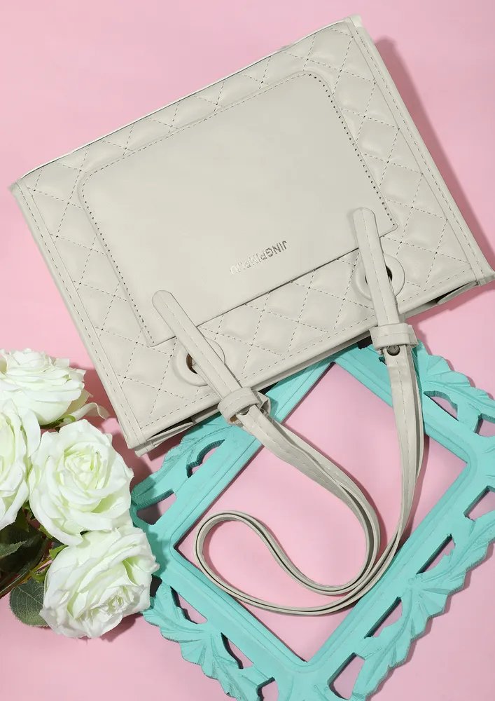 QUILTED WHITE HANDBAG