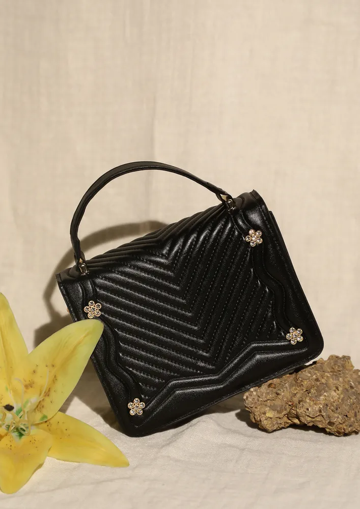 LINES AND SWIRLS BLACK SLING BAG