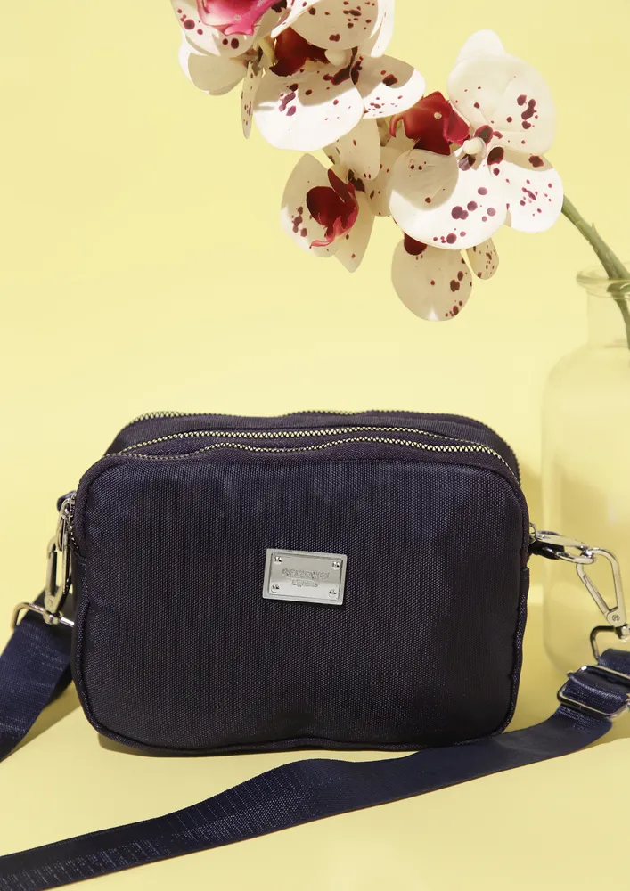 KEEP IT CLOSER BLUE SLING BAG