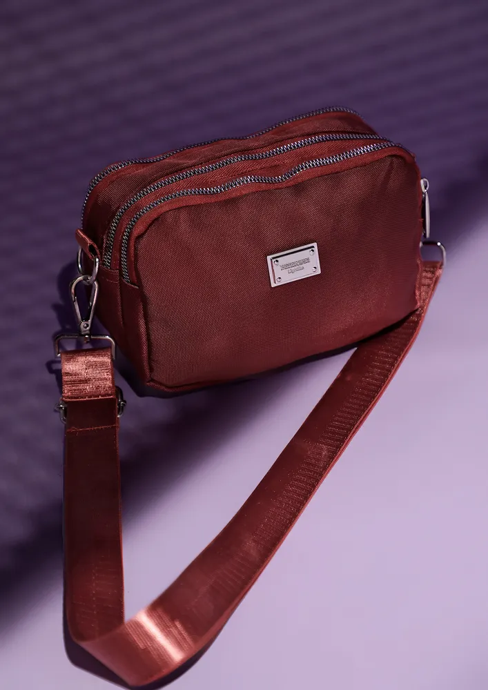 KEEP IT CLOSER RED SLING BAG