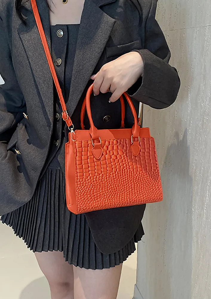 TEXTURED ORANGE DOUBLE TOP HANDLE SLING BAG