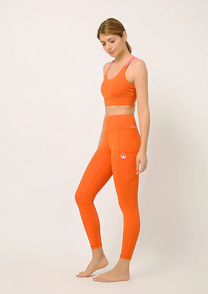 Buttr Sunset Orange Yoga Pants