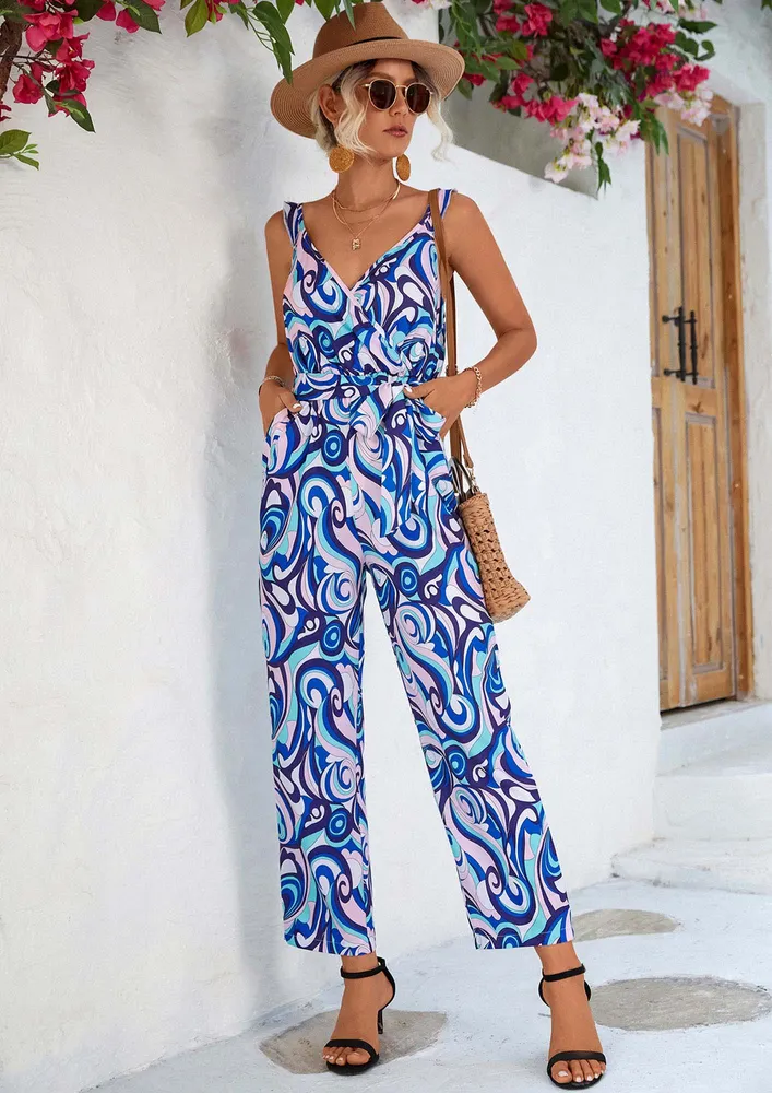 SURPLICE NECK GRAPHIC PRINT BLUE JUMPSUIT