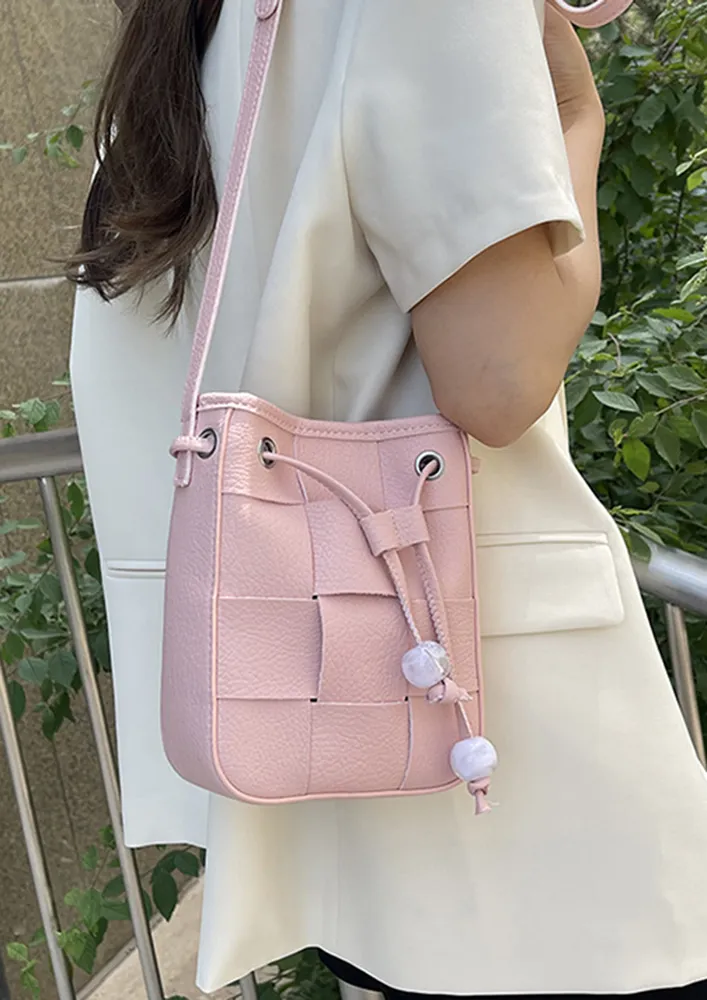 PINK TEXTURED DRAWSTRING CROSSBODY BAG