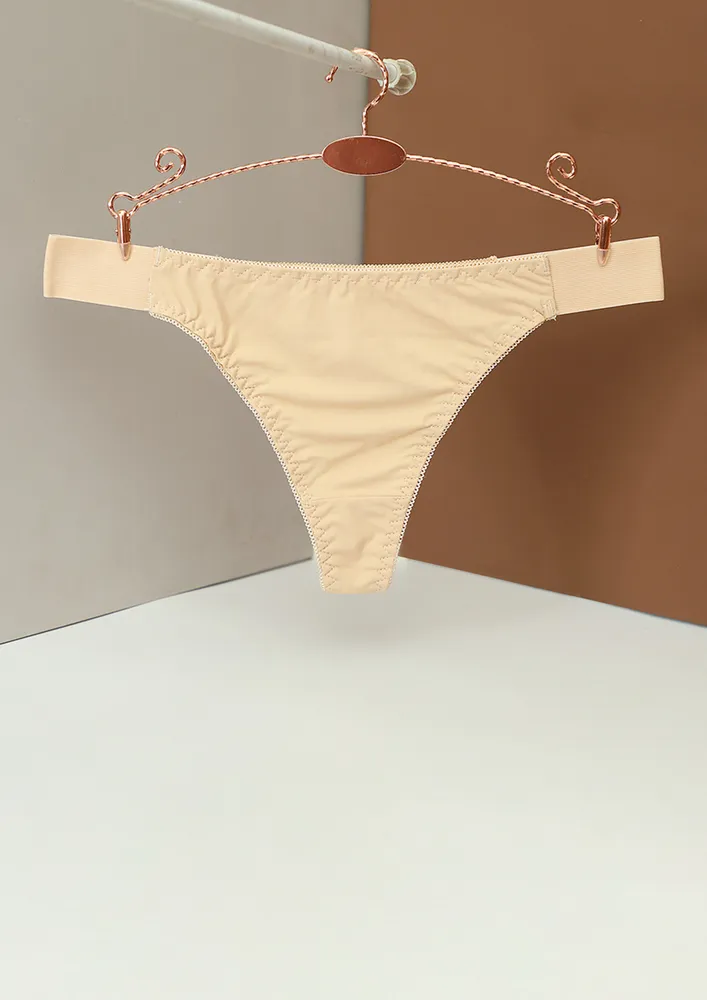 A SOLID BEIGE POLYAMIDE THONG BRIEF