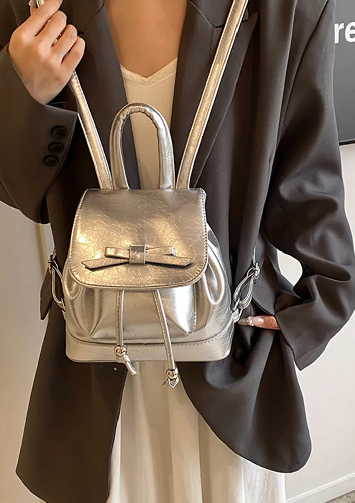 SILVER BOW-KNOT DETAIL FLAP BACKPACK