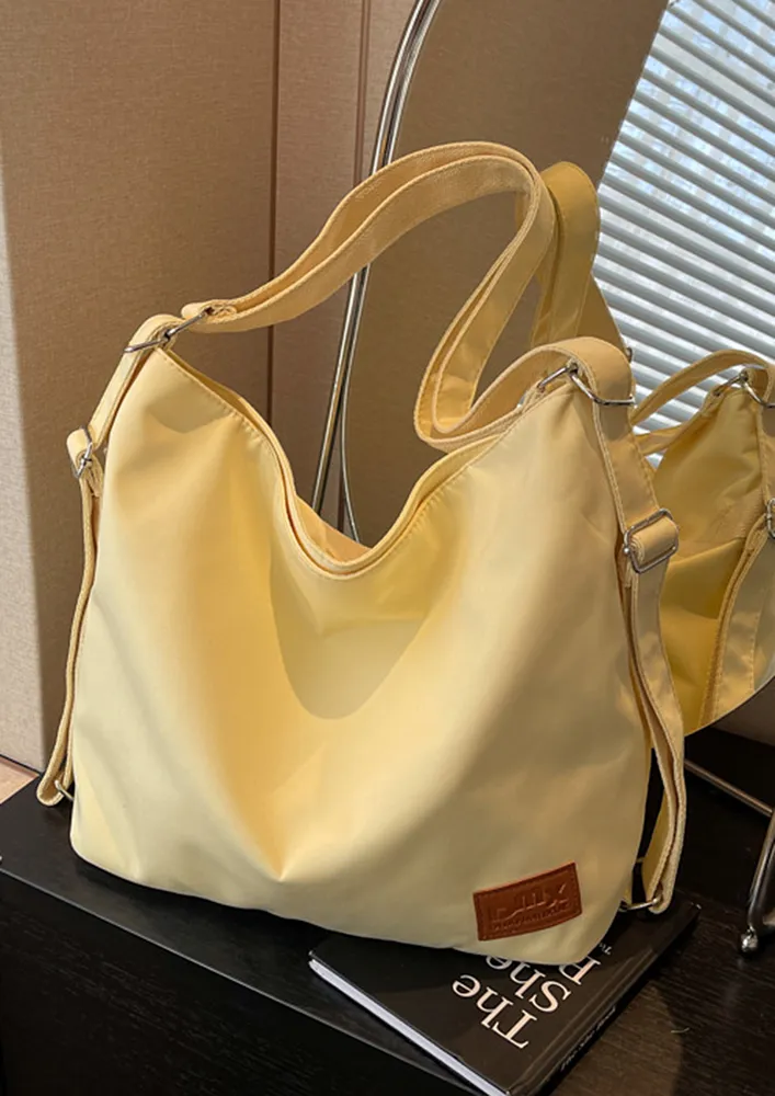 YELLOW ADJUSTABLE STRAP TOTE BAG