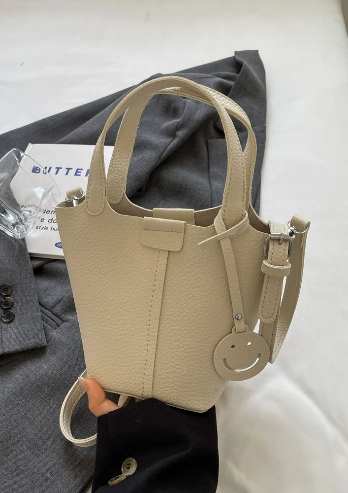 OFF-WHITE TEXTURED DOUBLE HANDLE BUCKET BAG