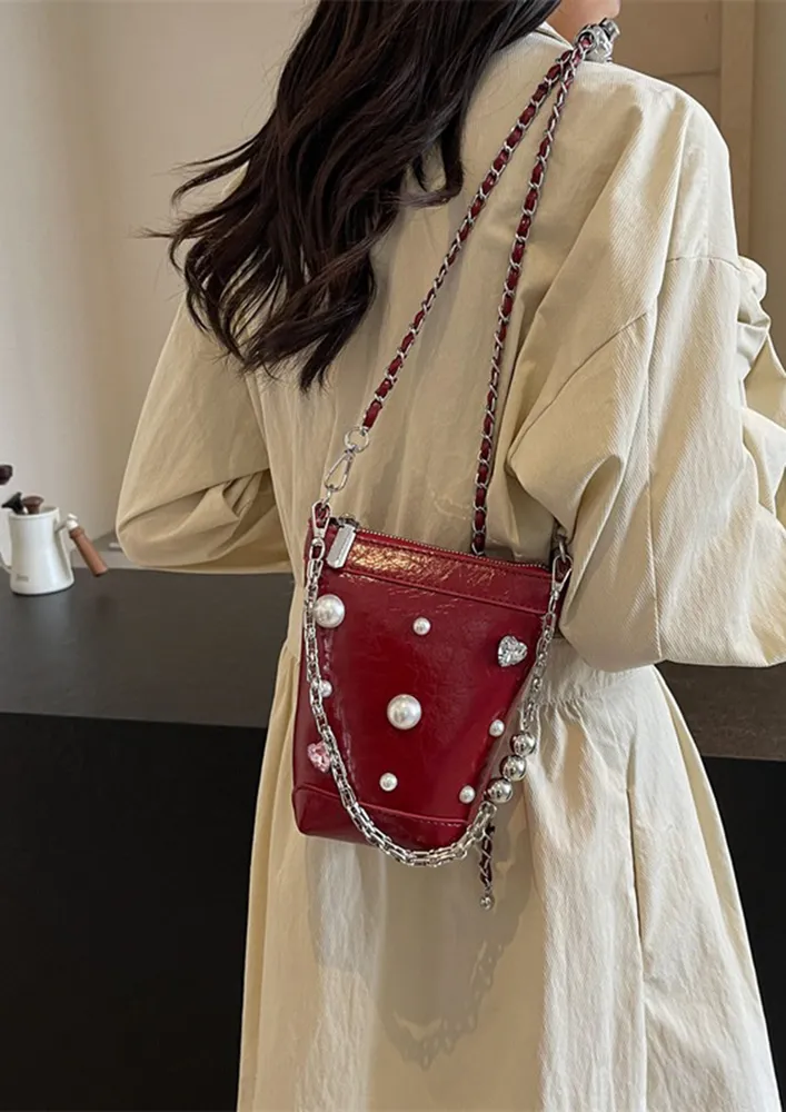 RED EMBELLISHED BUCKET BAG