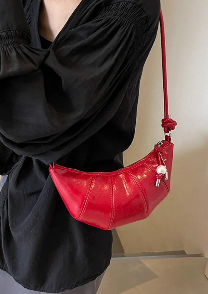 RED CRESCENT-SHAPE CROSSBODY BAG