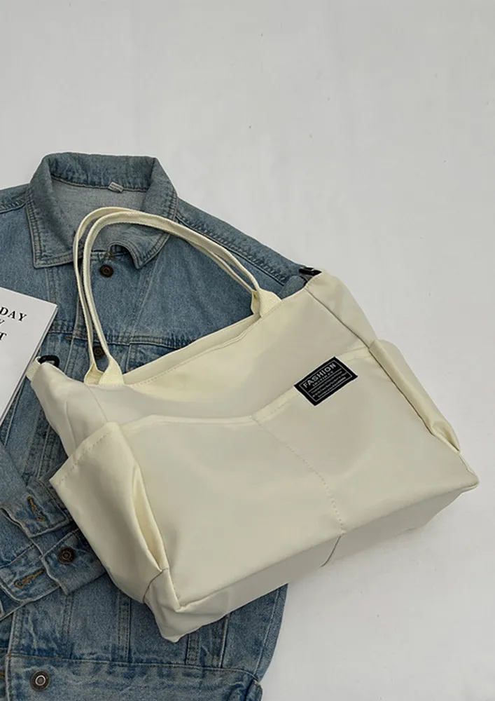 OPEN POCKETS OFF-WHITE SHOULDER BAG