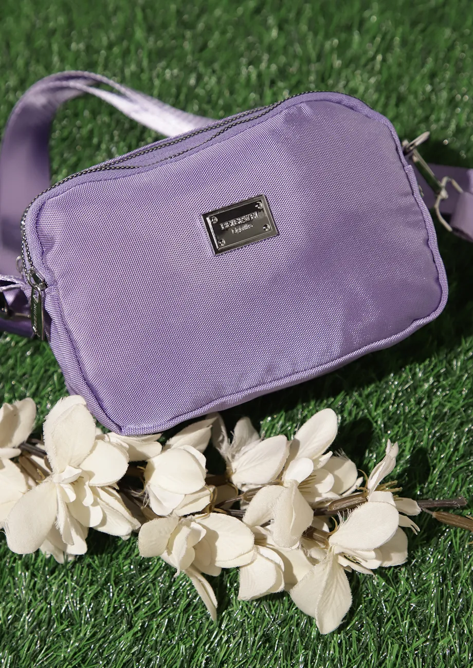 KEEP IT CLOSER LAVENDER SLING BAG