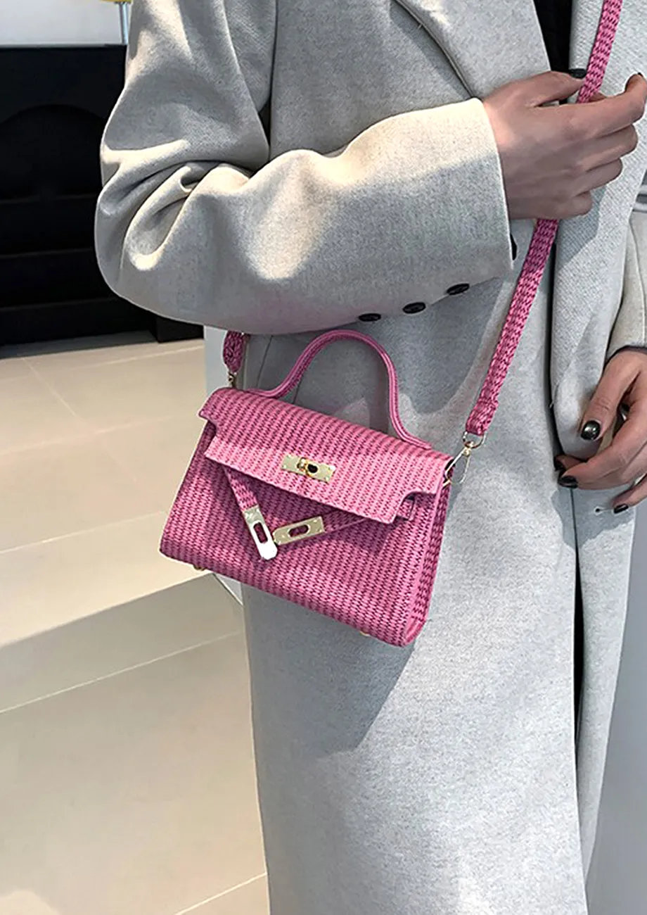 TEXTURED PINK TWIST LOCK FLAP SLING BAG
