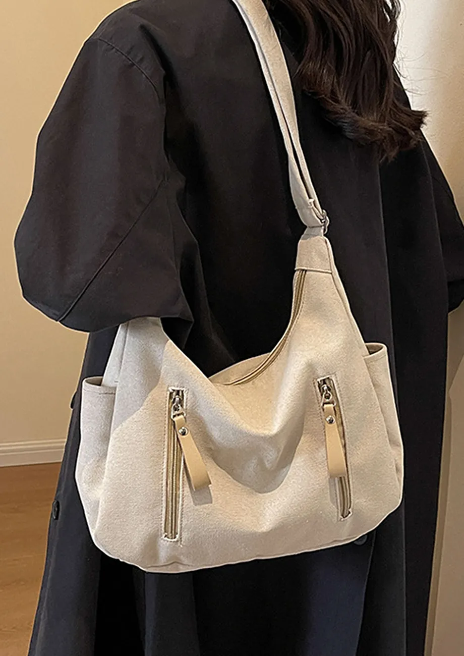 OFF-WHITE ADJUSTABLE STRAP CROSSBODY BAG