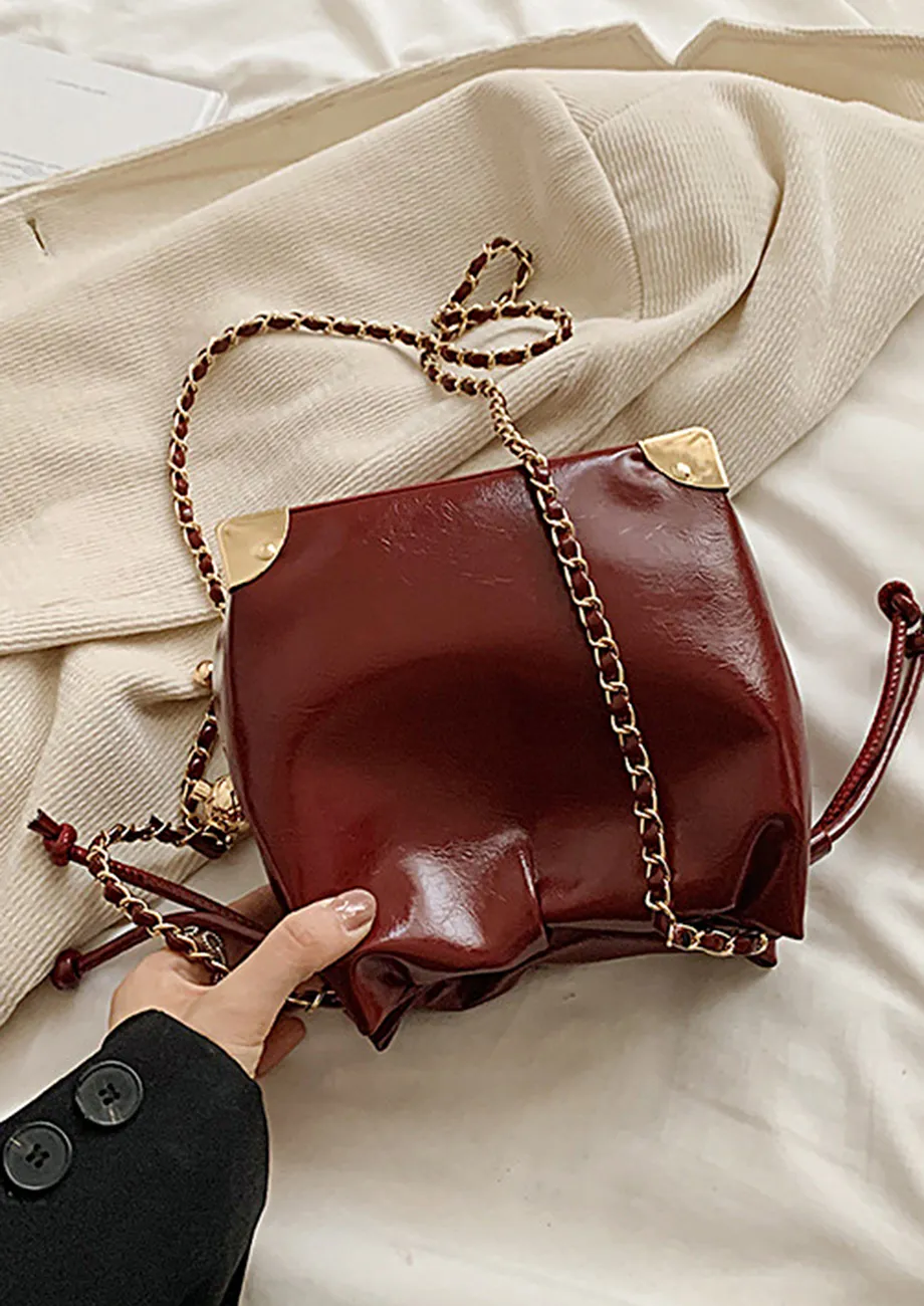 RED FAUX LEATHER BUCKET BAG