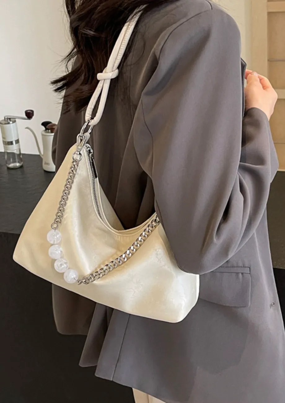 Buy KNOT-STRAP EMBOSSED OFF-WHITE SHOULDER BAG for Women Buy KNOT-STRAP EMBOSSED OFF-WHITE SHOULDER BAG for Women
